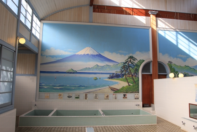 Mount Fuji mural on the wall of a sento bathing area